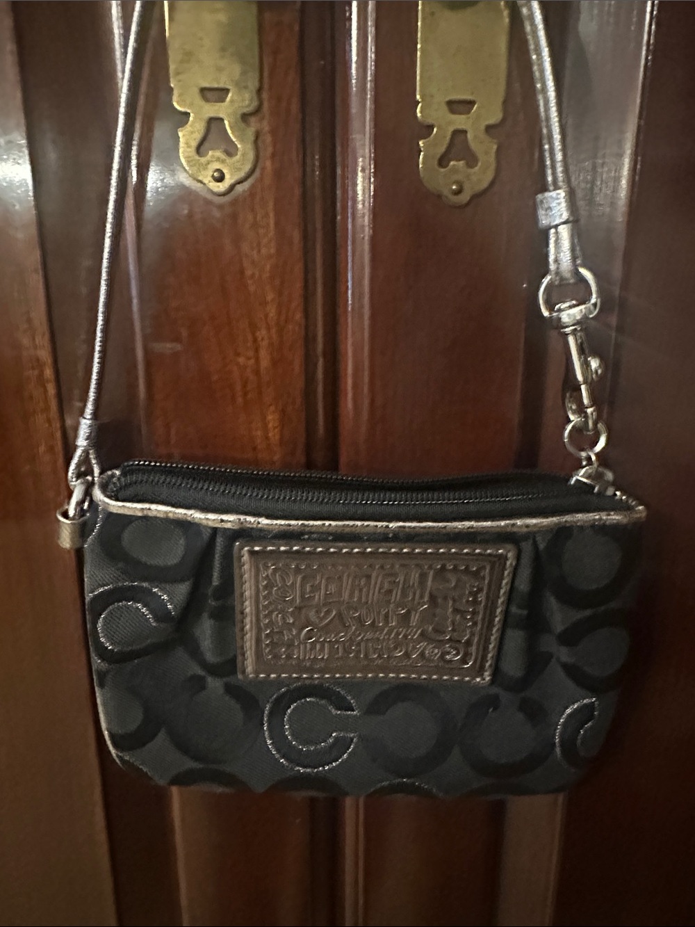 Coach Black Signature Mini Wristlet with Metallic Accents